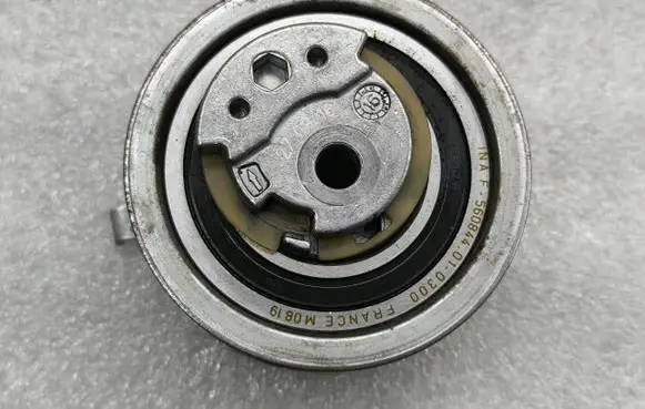 Volkswagen Caddy Timing belt tensioner F-560844