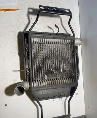 KIA Carens I Intercooler radiator 2827127350