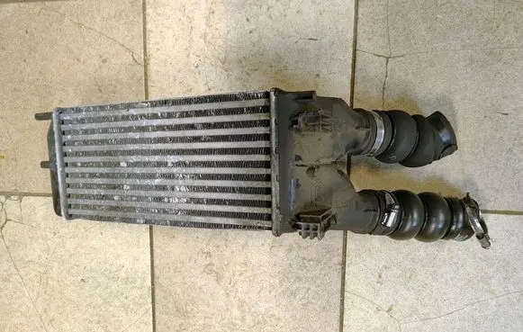 Peugeot Partner Intercooler radiator 9682434580