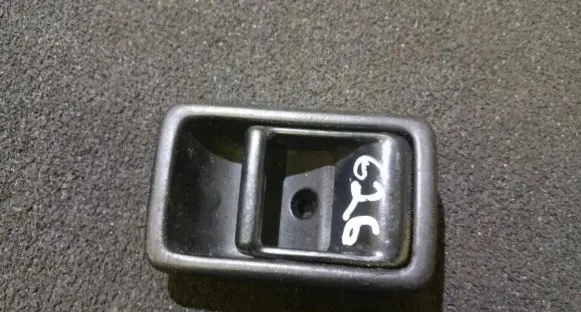 Mazda 323 Front door interior handle
