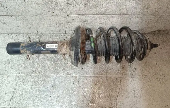 Volkswagen Golf IV Front shock absorber with coil spring 1J0413031AE