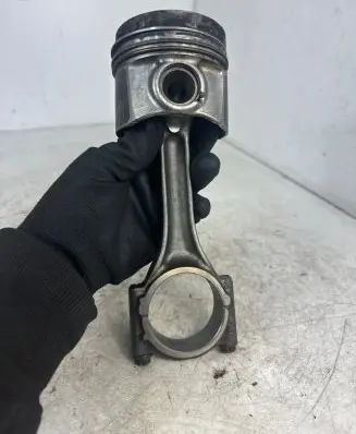 Piston with connecting rod