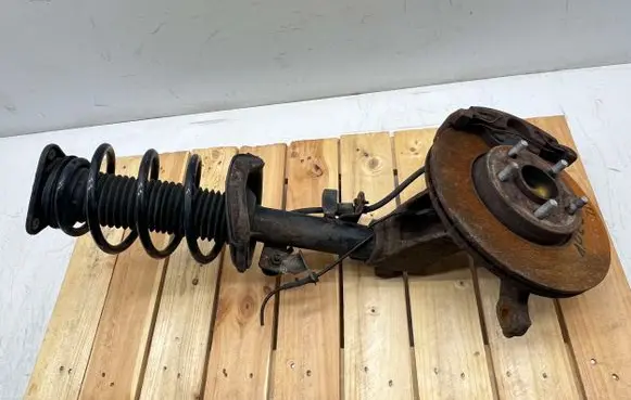 Front shock absorber with coil spring