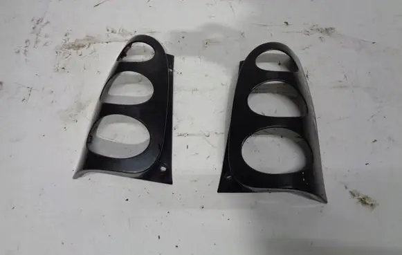Rear/tail light trim molding