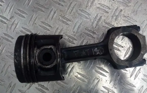 Piston with connecting rod