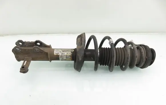 Opel Astra J Front shock absorber with coil spring 13354030