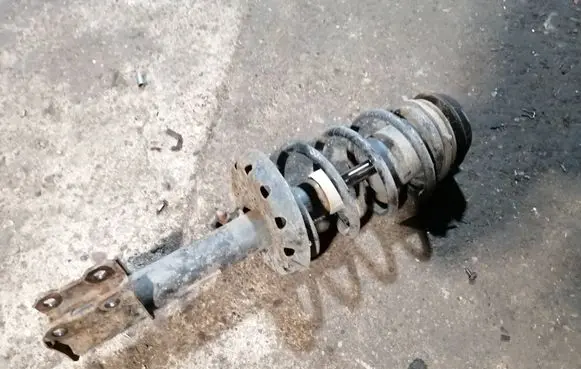 Opel Zafira A Front shock absorber with coil spring 22194342 24434747