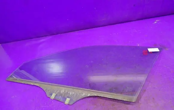 Mazda 323 Front door window glass four-door