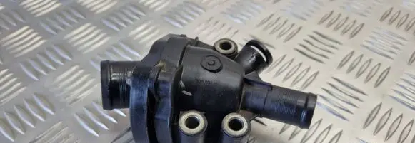 Thermostat/thermostat housing