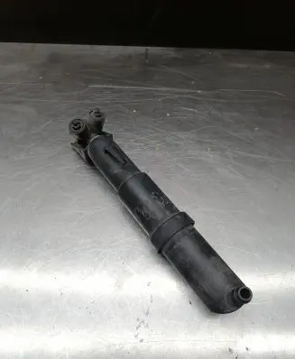 Headlight washer spray nozzle