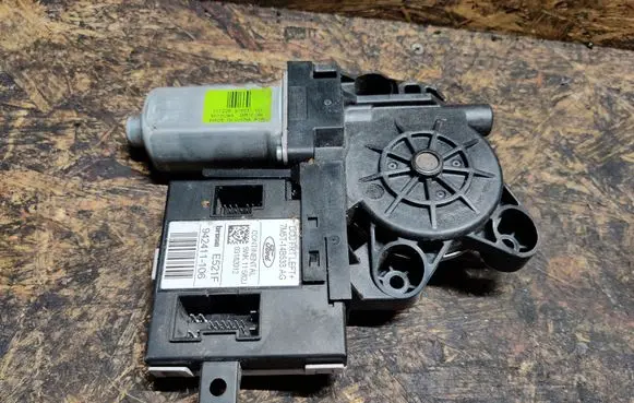Ford Kuga I Front door window regulator motor 7M5T14B533AG 111226