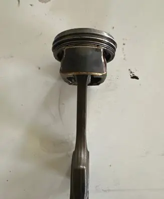 Piston with connecting rod