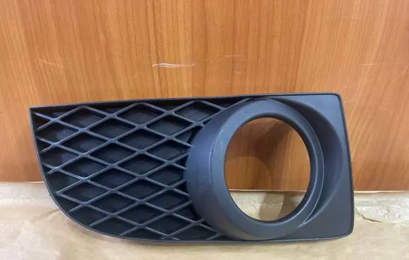Mazda Premacy Front bumper lower grill C14650C11