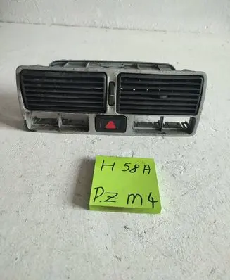 Volkswagen Golf IV Dash center air vent grill 284789