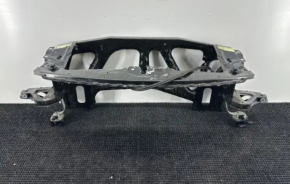 Radiator support slam panel