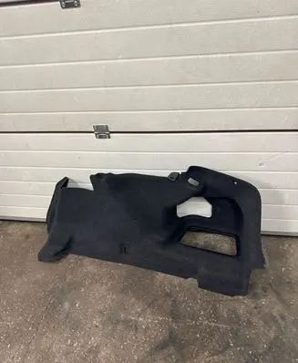 Trunk/boot lower side trim panel
