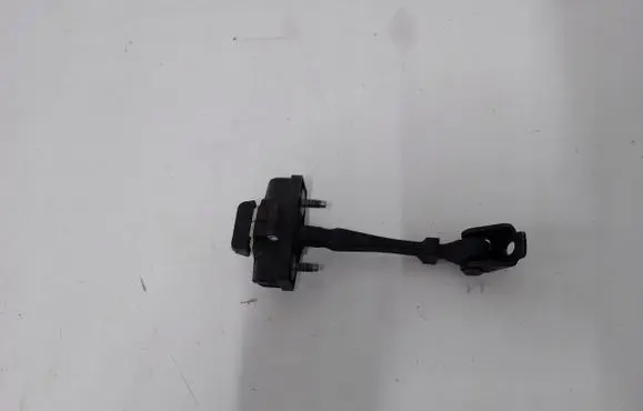Front door check strap stopper