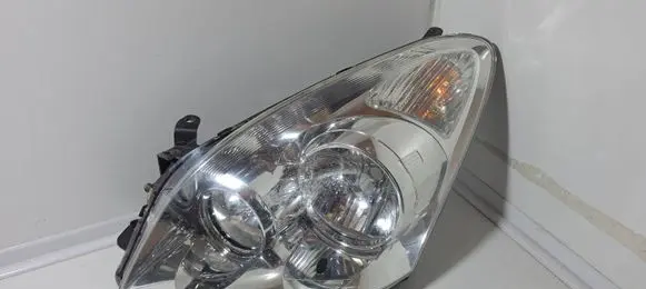 Toyota Corolla Verso AR10 Headlight/headlamp P7105L
