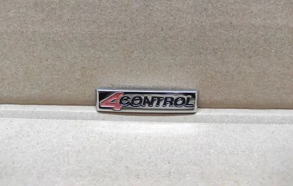 Renault Laguna III Front door emblem/model letters 990882613R