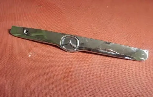 Mazda Tribute Rear light center trim bar blend 