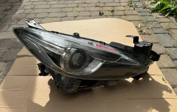 Mazda 3 II Headlight/headlamp BHR251030 S2409K010
