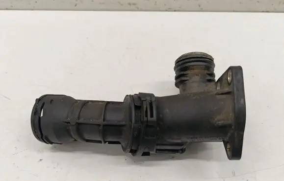 Volkswagen Golf VII Thermostat/thermostat housing 04L121111