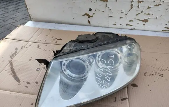Volkswagen Touareg I Headlight/headlamp 7L6941015CF