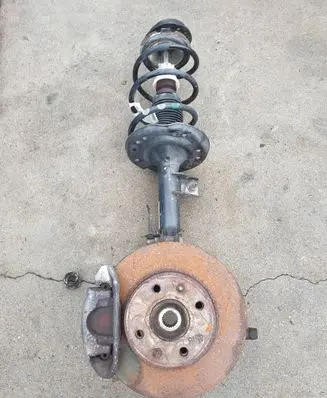 Front shock absorber with coil spring