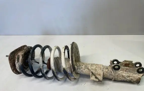 Volvo V70 Front shock absorber with coil spring 8667250A