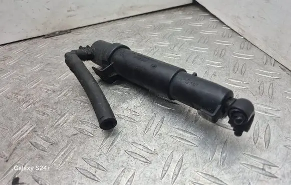 Headlight washer spray nozzle
