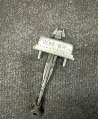 Rear door check strap stopper