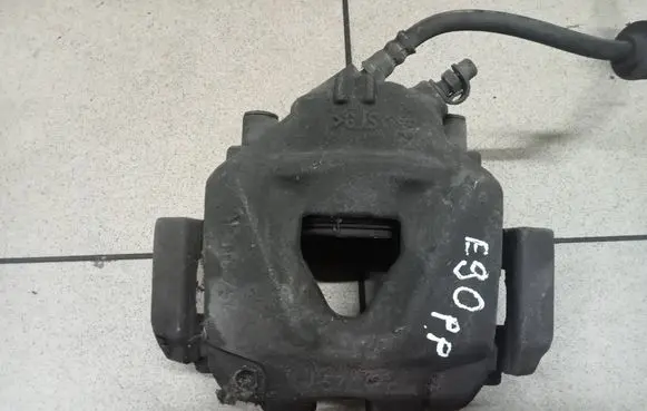 BMW 3 E90 E91 Front brake caliper 0000