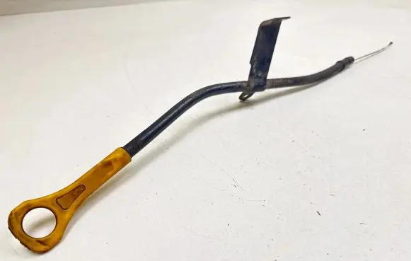 Oil level dip stick