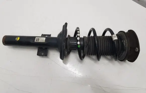 Skoda Scala Front shock absorber with coil spring 2Q0413031DC