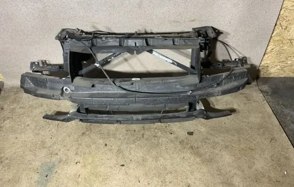 Radiator support slam panel