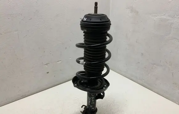 Opel Corsa E Front shock absorber with coil spring 13434139 22283524