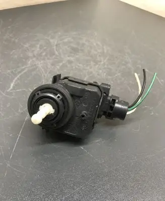 Renault Scenic I Headlight level adjustment motor 7700420736