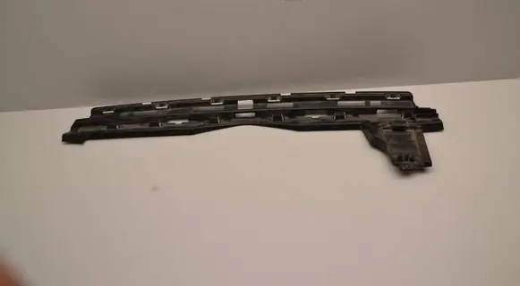 Rear bumper trim bar molding
