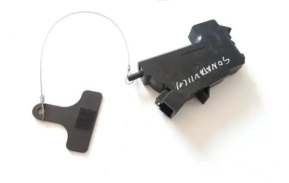 Fuel tank cap lock motor