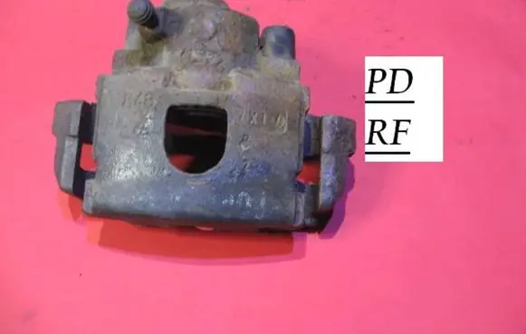 Ford Courier Front brake caliper 8487X1