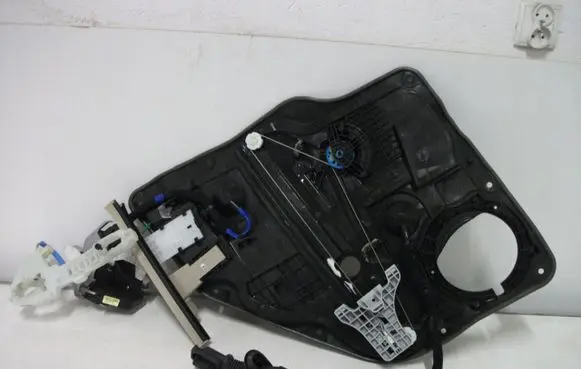 Rear door window regulator with motor