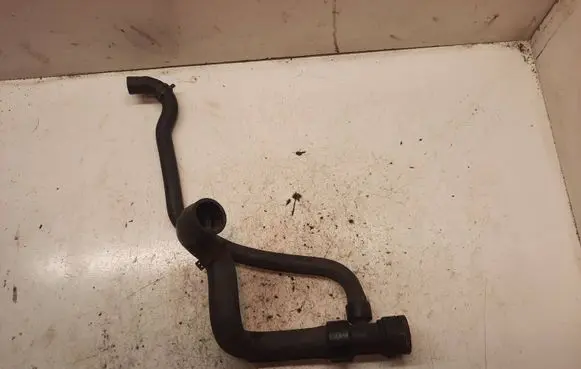 Volkswagen PASSAT B5 Engine coolant pipe/hose 8D0121055F