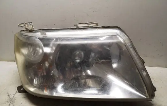 Suzuki Grand Vitara II Headlight/headlamp 10059076