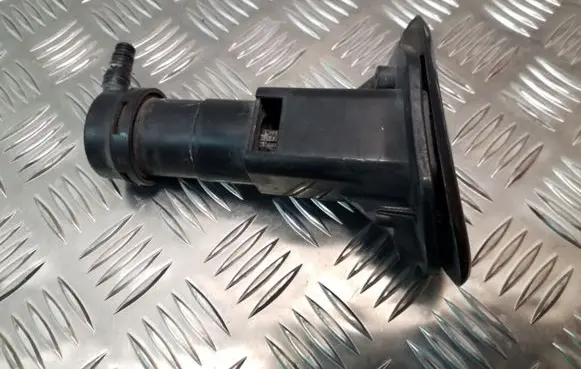 Headlight washer spray nozzle