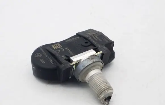 Ford Mondeo MK IV Tire pressure sensor 86921A159AE 0DCE65EB