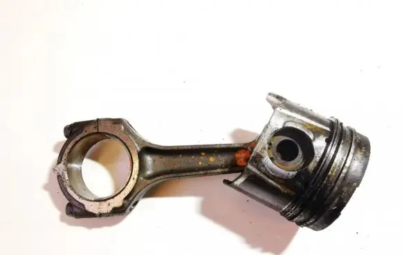 Piston with connecting rod