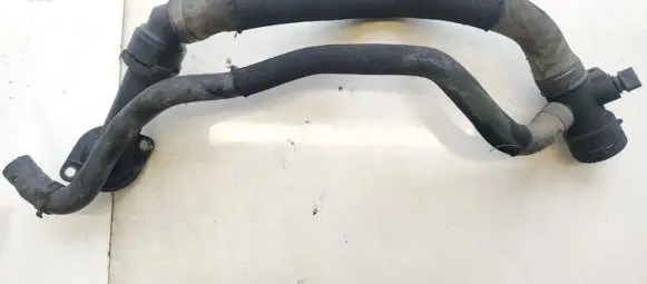 Volkswagen PASSAT B5.5 Engine coolant pipe/hose 06B121121 357121140