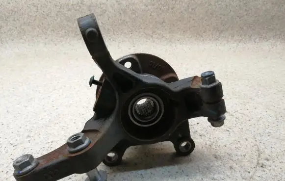 Dacia Spring Front wheel hub spindle knuckle