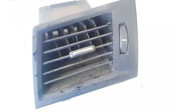 Subaru Legacy Dash center air vent grill 66110aj000