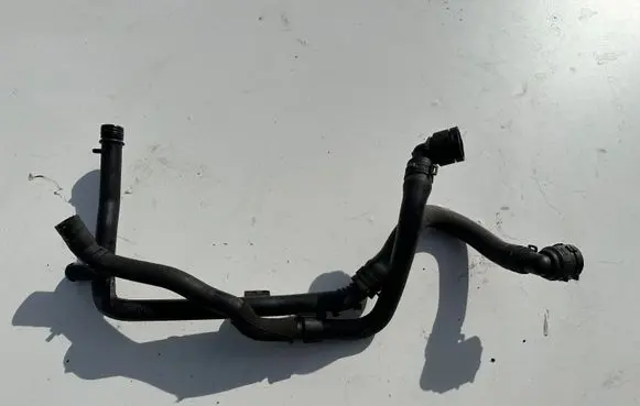 Volkswagen Beetle A5 Engine coolant pipe/hose 03L121065AJ V200S661